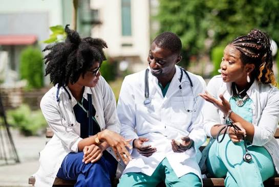 Group of clinicians in an outdoor discussion